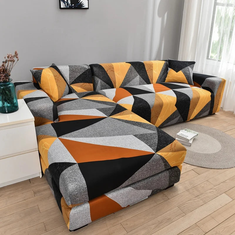 L-shaped sofa protector covers featuring a geometric pattern in black, gray, orange, and yellow tones.