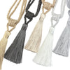 Elegant curtain tiebacks with tassels in various neutral tones like beige, gray, and black.