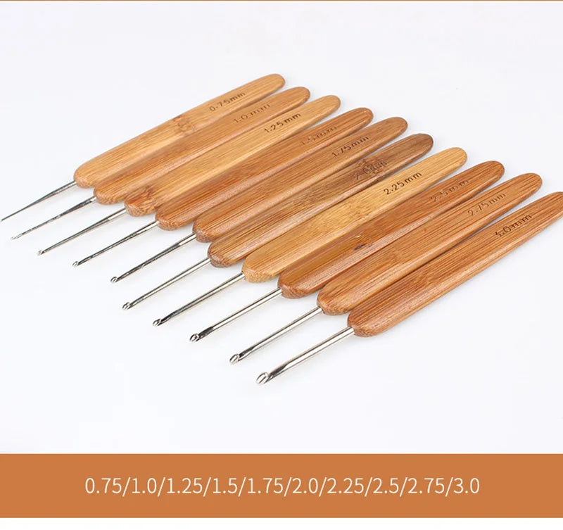 A set of bamboo crochet knitting needles with various sizes ranging from 0.75mm to 3.0mm.