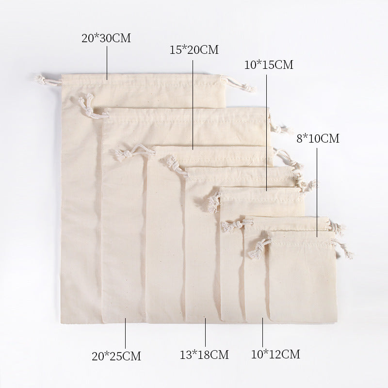A set of ten natural beige cotton drawstring gift bags displayed in a vertical line with various sizes.