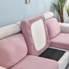 Pink stretch sofa seat cushion protector slipcover with a white rectangular insert