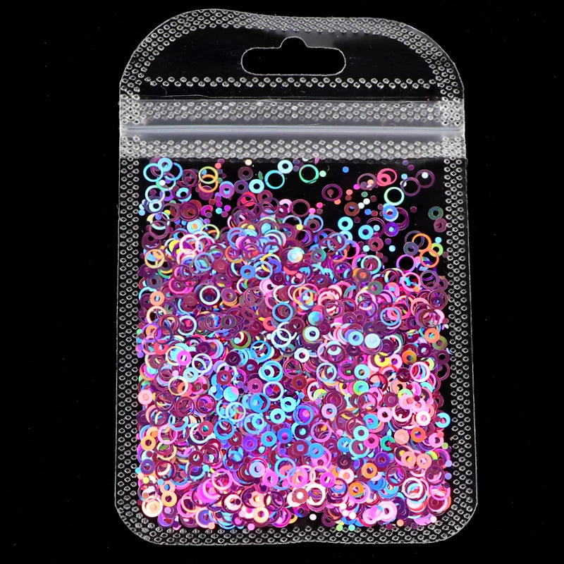 A clear plastic bag filled with colorful iridescent glitter for epoxy art