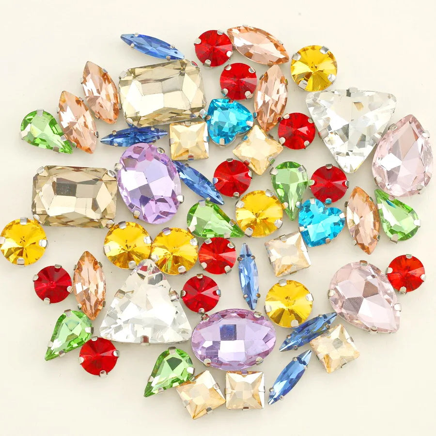 A collection of 50 assorted silver claw rhinestone decorations in various colors including pink, green, blue, yellow, and red