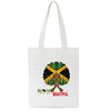 White tote bag featuring a black and yellow cross design on the front.