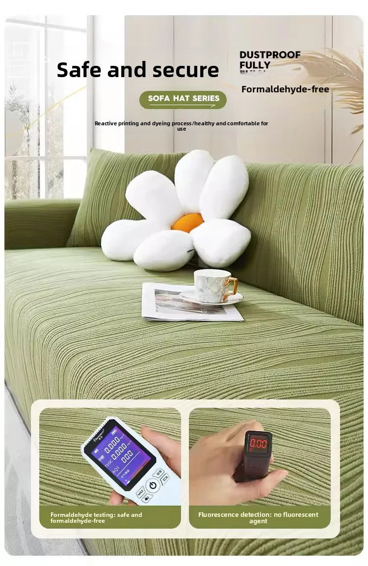 A green sofa cover with white decorative pillows is shown, highlighting its safe and secure features.