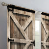 A pair of rustic wooden barn doors with diagonal cross bracing and black hardware, set in a light-colored room.