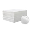 A stack of white disposable non-woven beauty and salon sheets with a circular close-up view of the sheet texture.