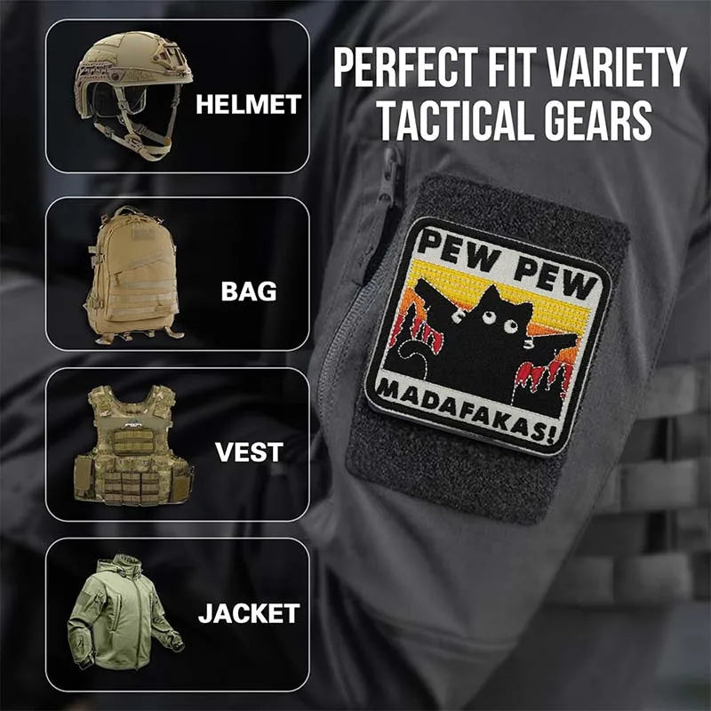 A close-up of tactical gear including a helmet, bag, vest, and jacket featuring an embroidered funny animal meme patch.