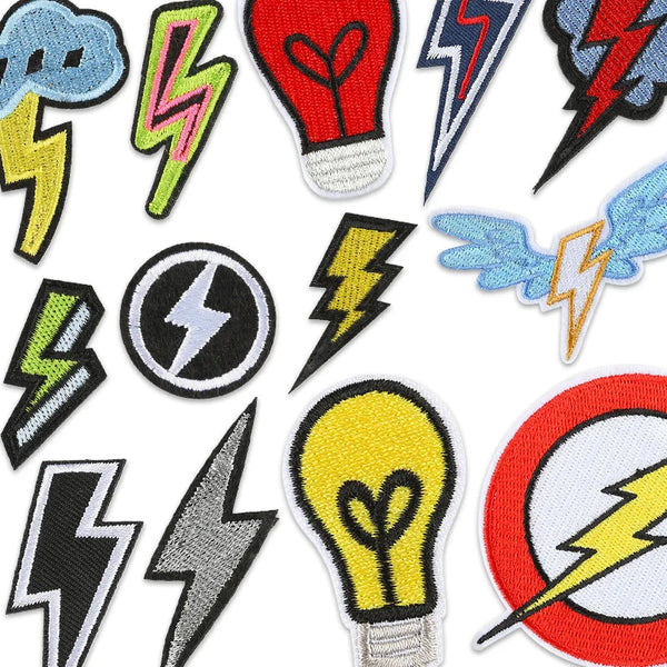 A collection of embroidered lightning bolt and lightbulb patches in various colors like blue, green, red, and yellow.