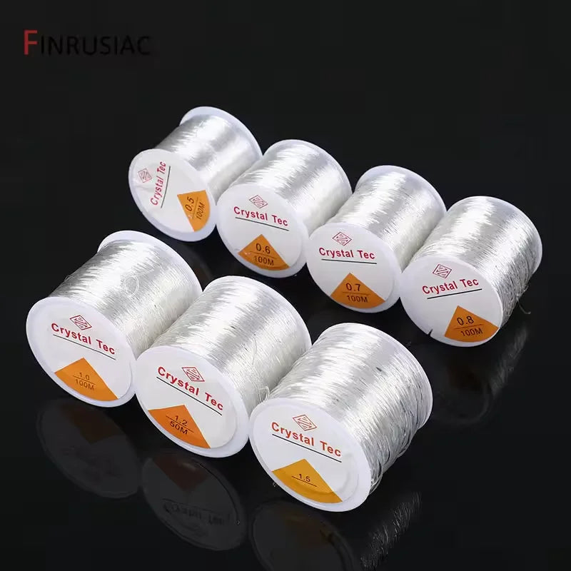 Rolls of silver-colored crystal elastic cord for jewelry making in various gauges