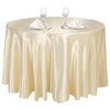 Elegant satin gold round tablecloth set with glassware and silverware for events