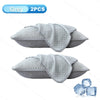 Grey ice silk cooling pillowcases shown in a flat lay view with ice cubes