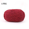 A ball of 3mm matte chenille yarn in a deep reddish-maroon color.