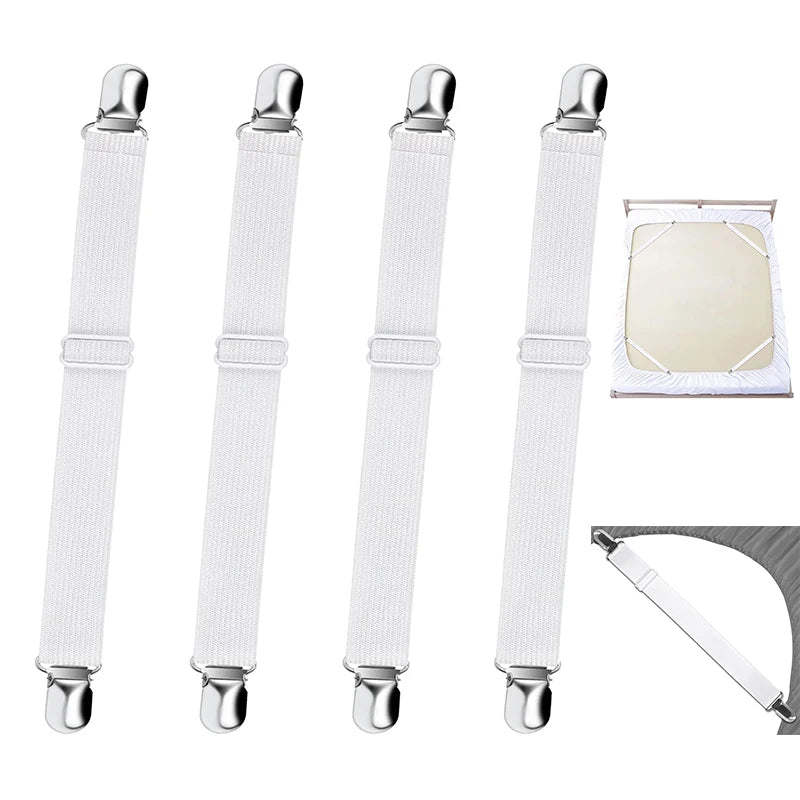 Four white adjustable bed sheet grippers with metal fasteners and one gray strap shown.