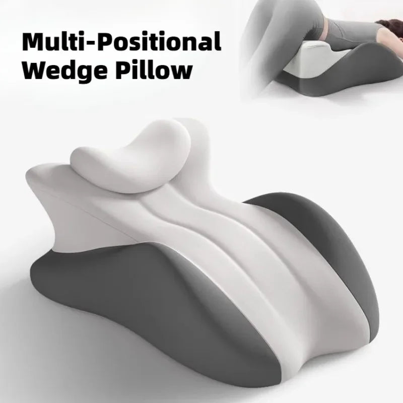 A multi-positional wedge pillow in gray and white, shown from a side view.