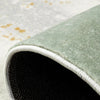 A roll of Koi fish pattern round rug in a muted sage green color.