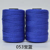 Blue hand knitting and crochet cord wound on spools