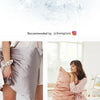 A close-up of a silky pink pillowcase and silk fabric products displayed in various contexts.