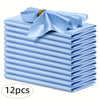 A stack of twelve light blue silky satin dinner napkins with a decorative bow on top.