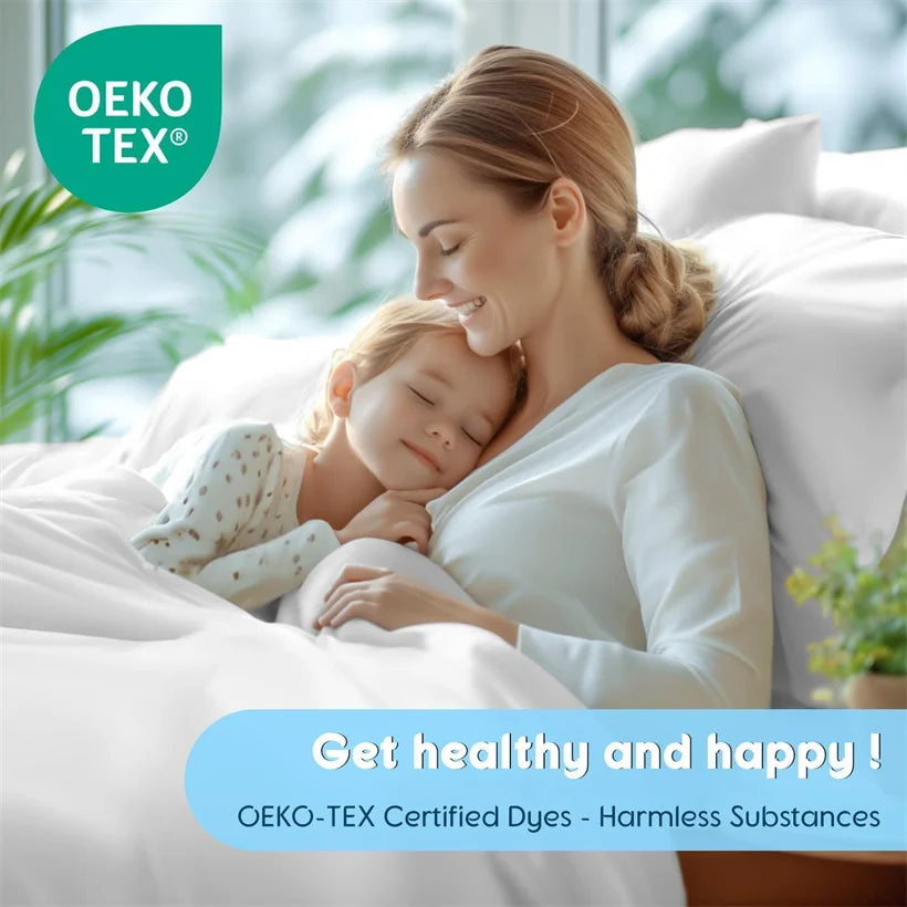 A mother gently holds a sleeping baby while lying in luxury bedding, emphasizing healthy and happy with OEKO-TEX certified dy