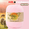 Pink silk and cashmere yarn balls packaged for knitting and crochet projects
