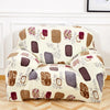 A beige slipcover for a sofa or chair featuring a pattern of dark purple and brown geometric shapes and small white flowers.