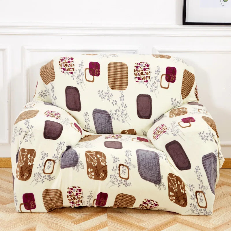 A beige slipcover for a sofa or chair featuring a pattern of dark purple and brown geometric shapes and small white flowers.