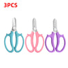 Three pairs of precision floral and bonsai shears in various colors including silver, teal, pink, and purple.