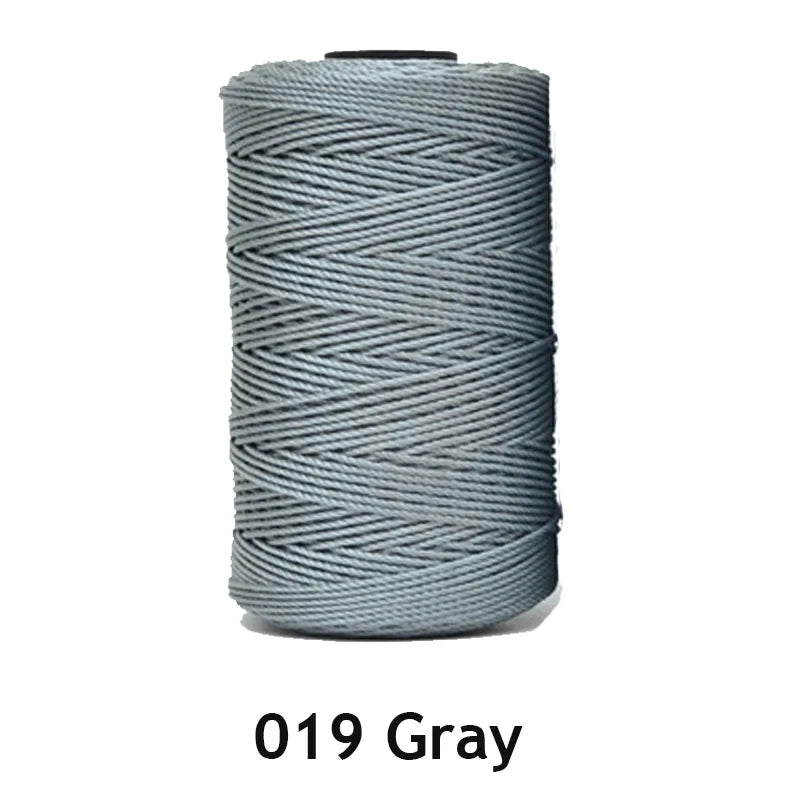 A spool of 1.5mm gray ice silk crochet yarn for crafting and sewing.