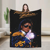 A black graphic throw blanket featuring a portrait of Michael Jackson in a military-style jacket.