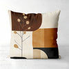 A decorative pillow cover featuring geometric shapes in earthy tones of brown, tan, and black on a cream background.
