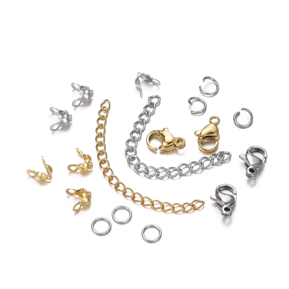 A collection of silver and gold lobster clasp findings for jewelry making.