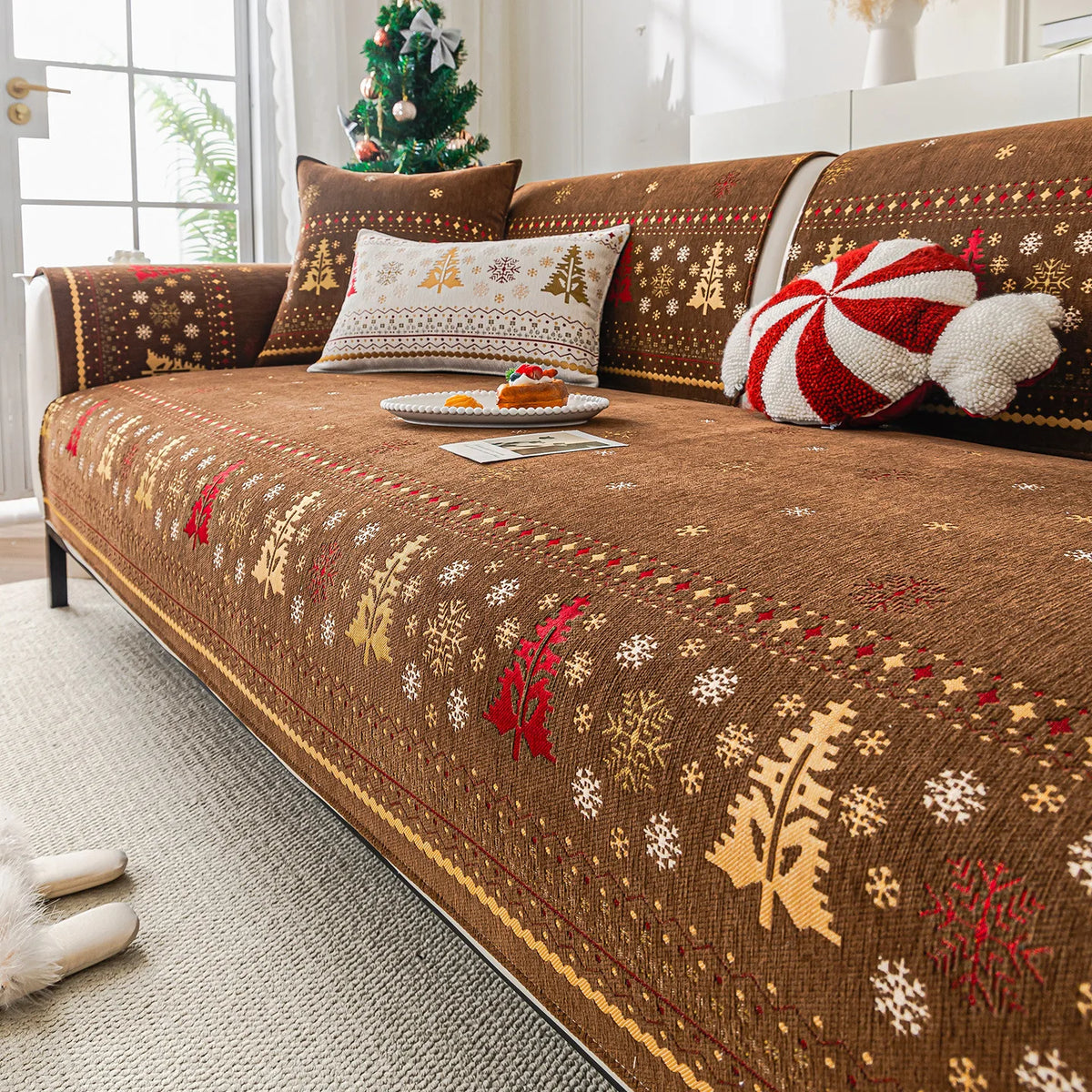 Brown decorative sofa seat covers featuring gold and red snowflake patterns with white accents.