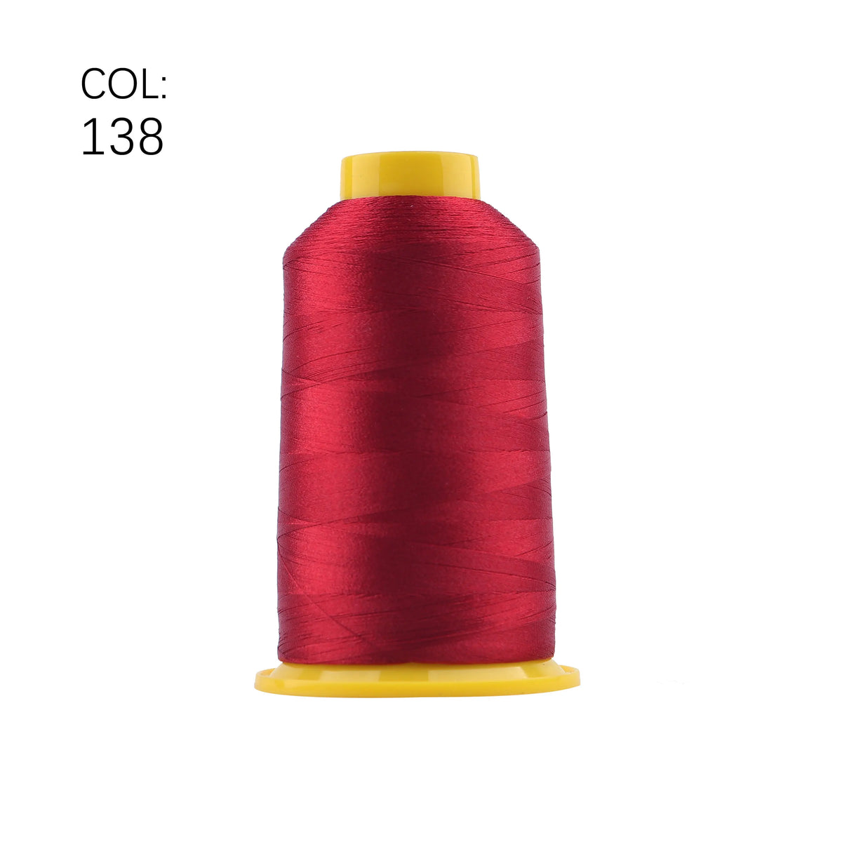 A spool of deep red embroidery thread with a yellow core.