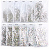 A collection of flatback rhinestones in various colors and sizes packaged in small plastic bags.