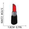 A black iron-on patch with a red tip and silver trim, shown against a measurement scale.