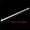 White adjustable metal curtain rod, 18-27cm long.