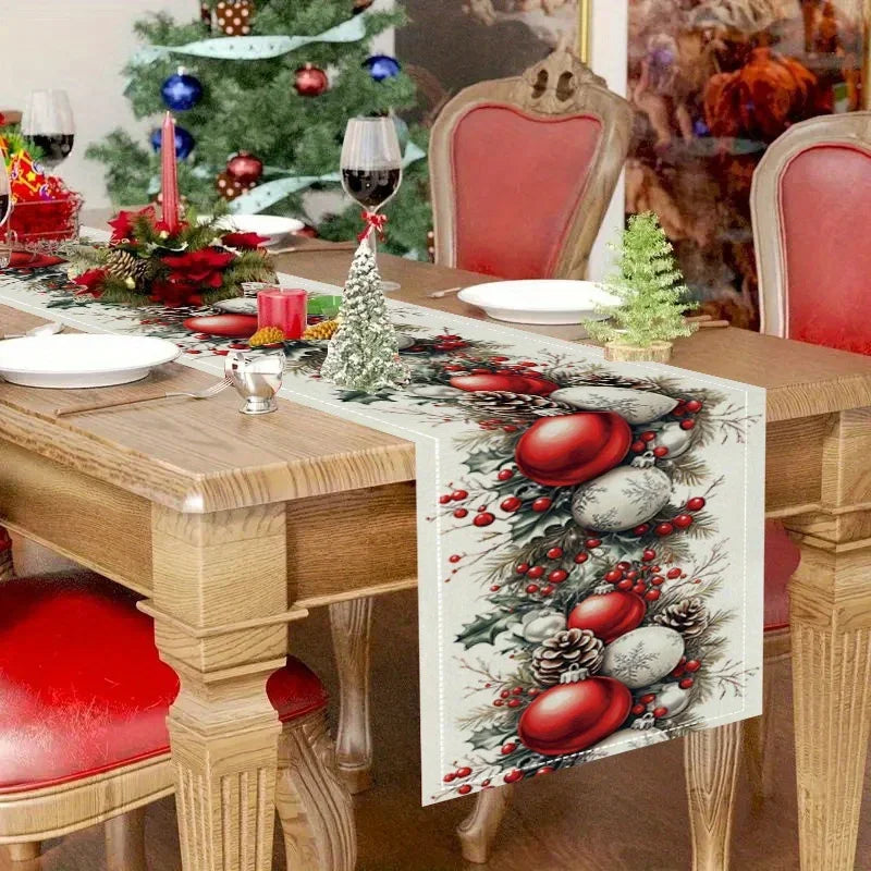 Christmas pine cone and red berry linen table runner on a wooden dining table.