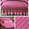 Pink quilted velvet bed skirt with gold embroidery and piping for winter decor