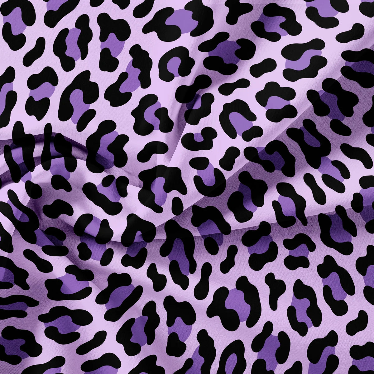 Purple and black leopard print fabric draped in soft folds.