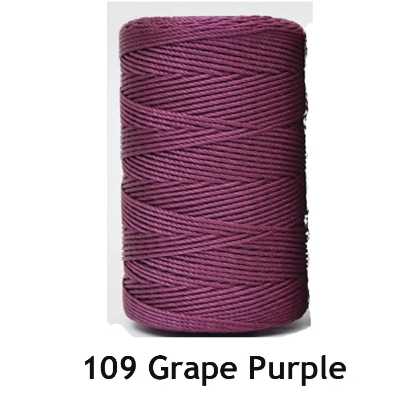 A spool of 1.5mm Ice Silk crochet yarn in Grape Purple color.