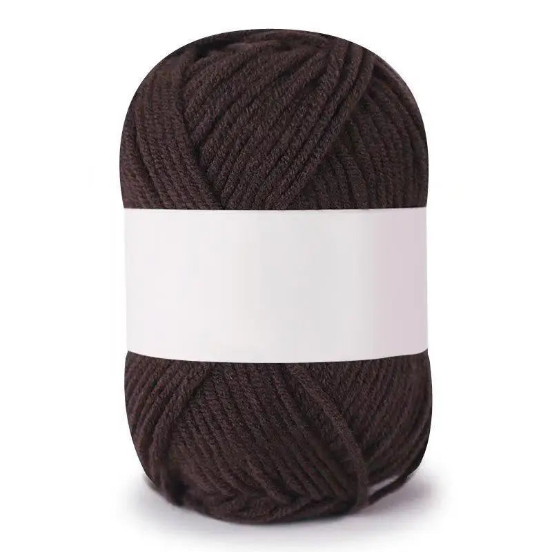 A ball of dark brown soft milk cotton knitting yarn