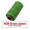 A roll of N29 Grass green waxed thread for leather and crafting.