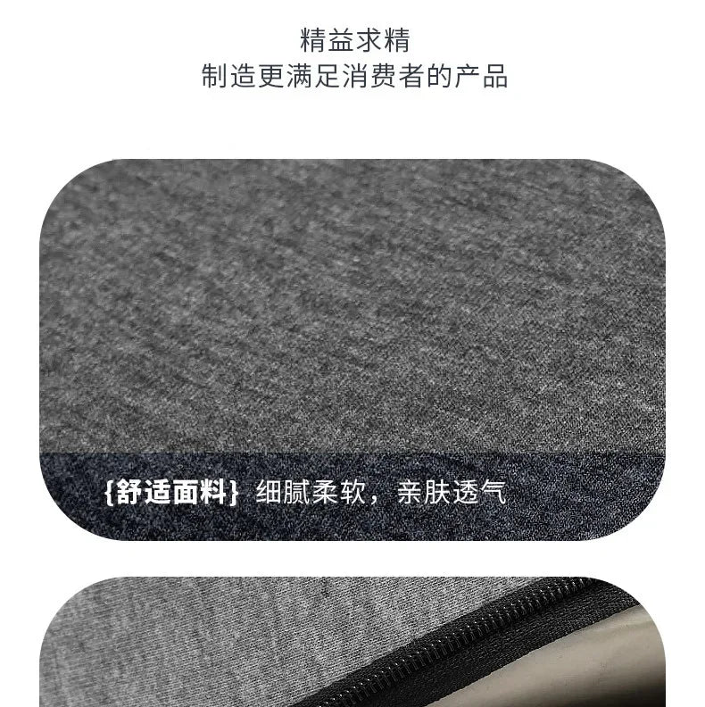 Gray memory foam lumbar support cushion with a black zipper and removable cotton cover