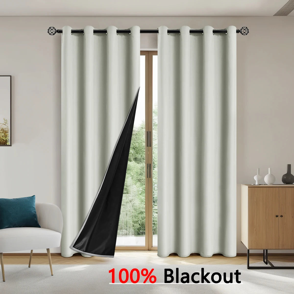 Pair of floor-length gray blackout curtains hanging in a doorway