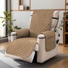 A beige washable slipcover for a recliner sofa with a black anti-slip strap shown in a modern living room.