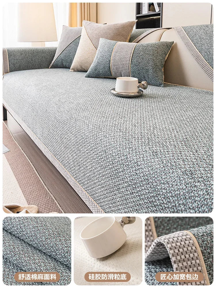 A woven sofa cushion cover in gray and beige tones with decorative piping, shown on a sofa.