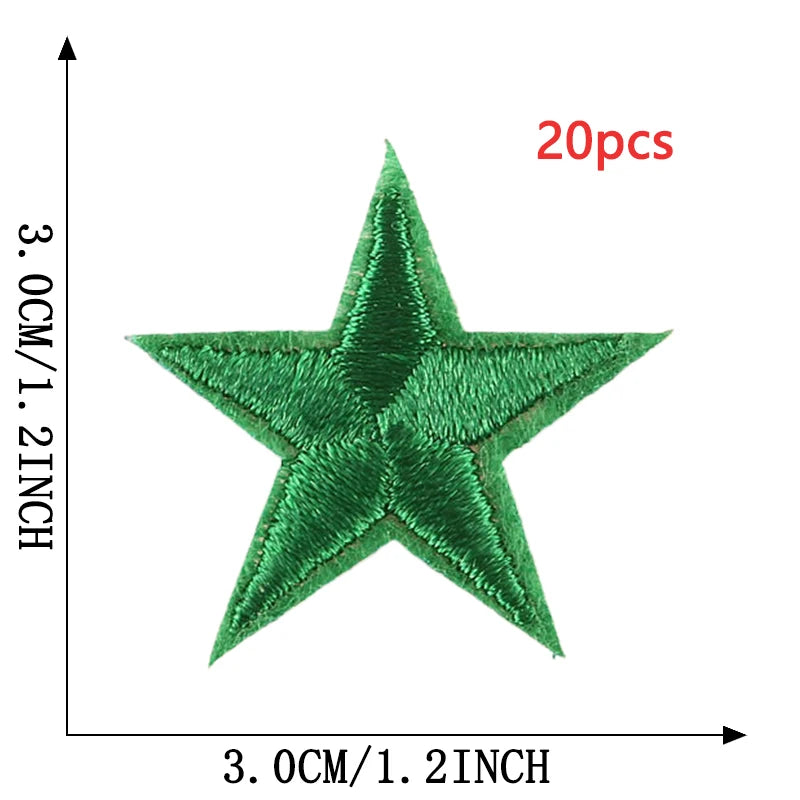 A green five-pointed star embroidery patch shown against a measurement scale.