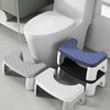 A white adjustable adult toilet squat stool with a blue seat is shown next to a modern toilet.