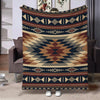 A rectangular throw blanket featuring a geometric ethnic print in shades of brown, beige, and navy blue.